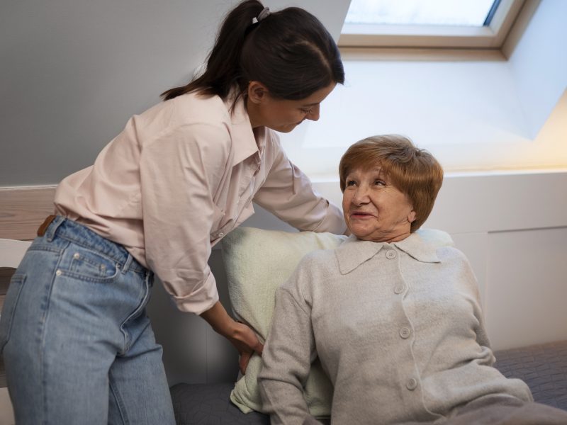 female-nurse-taking-care-elderly-person